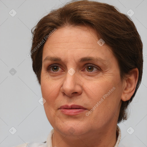 Joyful white adult female with short  brown hair and brown eyes