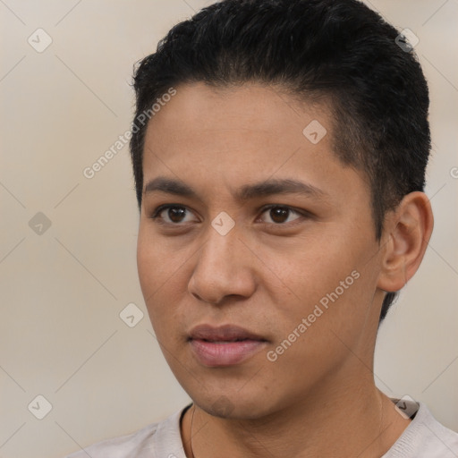 Neutral latino young-adult male with short  black hair and brown eyes