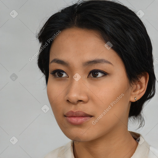 Neutral asian young-adult female with medium  black hair and brown eyes