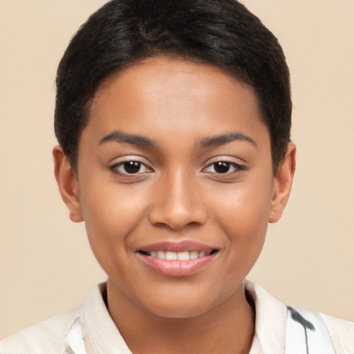 Joyful latino young-adult female with short  brown hair and brown eyes