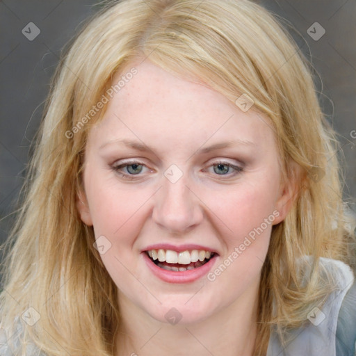 Joyful white young-adult female with medium  brown hair and blue eyes