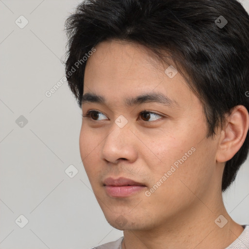 Neutral white young-adult male with short  black hair and brown eyes