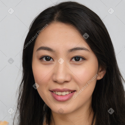 Joyful asian young-adult female with long  brown hair and brown eyes