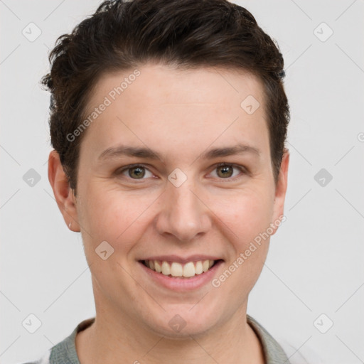 Joyful white young-adult female with short  brown hair and grey eyes