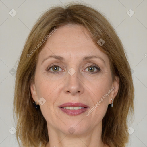 Joyful white adult female with medium  brown hair and brown eyes