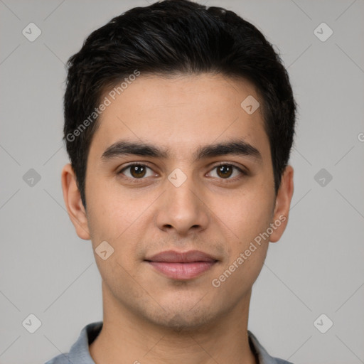 Joyful white young-adult male with short  black hair and brown eyes