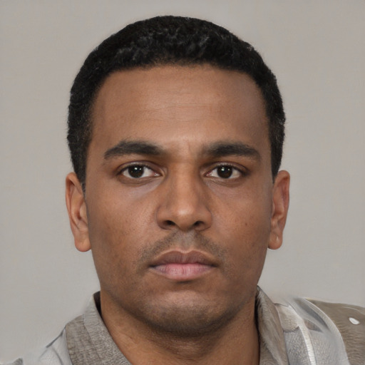 Neutral latino young-adult male with short  brown hair and brown eyes