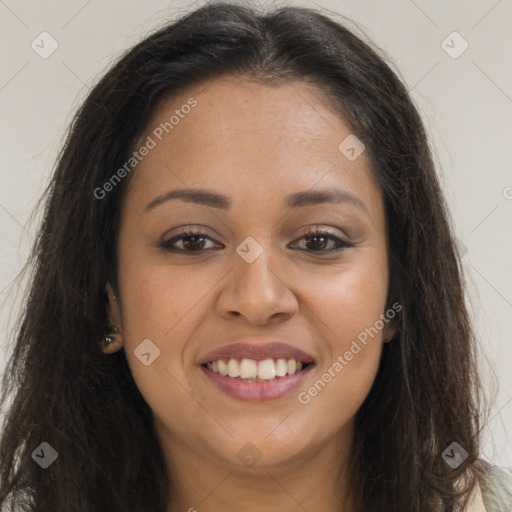 Joyful latino young-adult female with long  brown hair and brown eyes