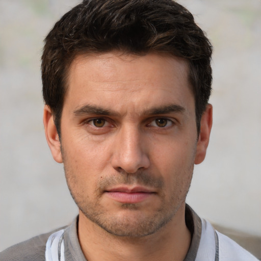 Neutral white young-adult male with short  brown hair and brown eyes