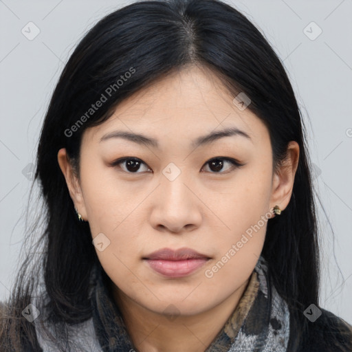 Joyful asian young-adult female with medium  black hair and brown eyes