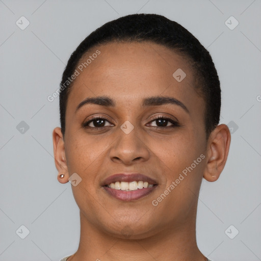 Joyful latino young-adult female with short  brown hair and brown eyes