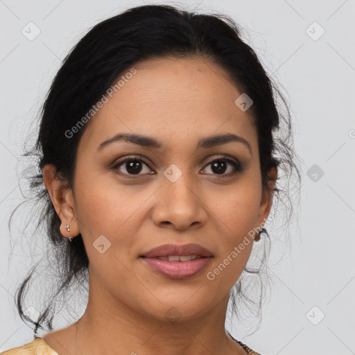 Joyful latino young-adult female with medium  brown hair and brown eyes