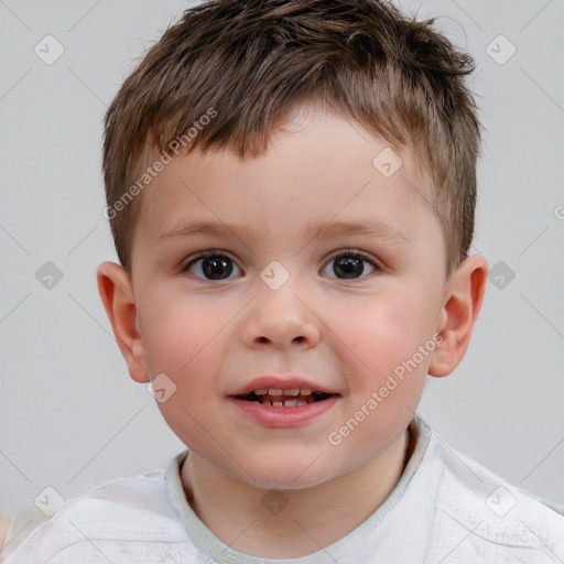 Joyful white child male with short  brown hair and brown eyes