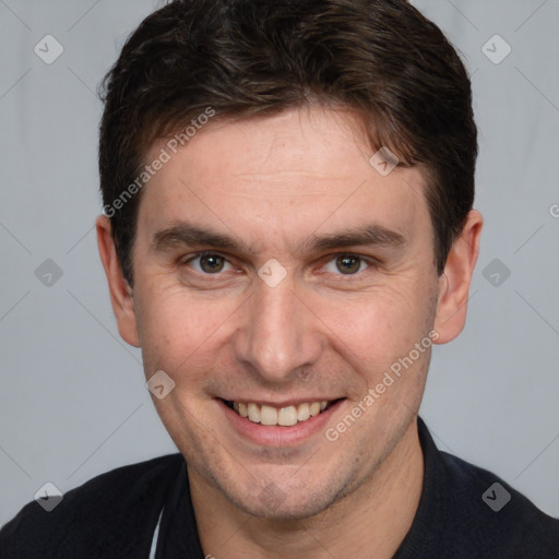 Joyful white adult male with short  brown hair and brown eyes