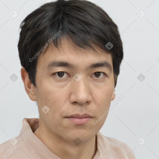 Neutral asian young-adult male with short  brown hair and brown eyes