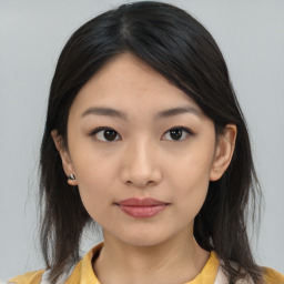 Neutral asian young-adult female with medium  brown hair and brown eyes