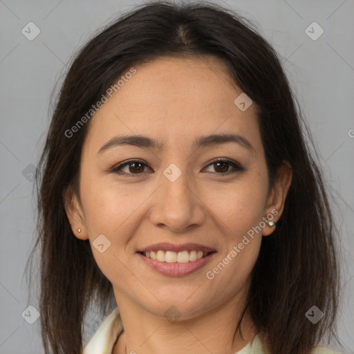 Joyful latino young-adult female with medium  brown hair and brown eyes