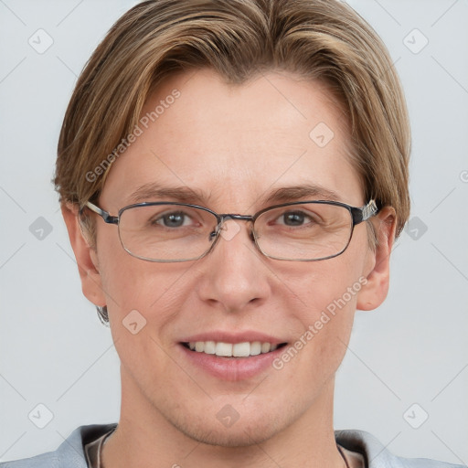 Joyful white adult female with short  brown hair and grey eyes