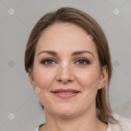 Joyful white young-adult female with medium  brown hair and grey eyes