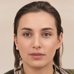 Neutral white young-adult female with medium  brown hair and brown eyes