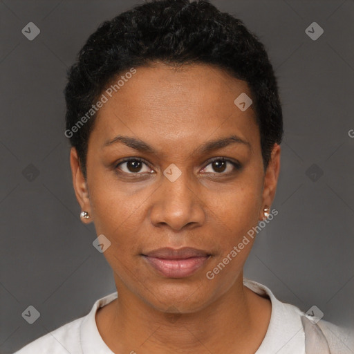 Joyful black young-adult female with short  black hair and brown eyes