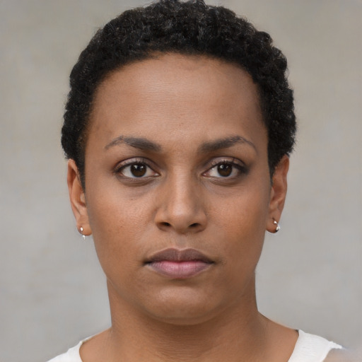 Neutral black young-adult female with short  brown hair and brown eyes