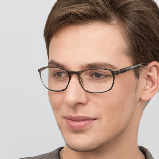 Neutral white young-adult male with short  brown hair and grey eyes