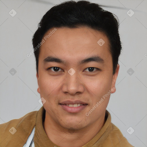 Joyful white young-adult male with short  black hair and brown eyes