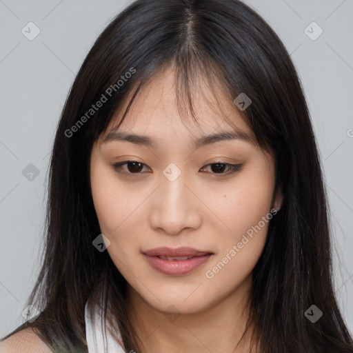 Joyful asian young-adult female with long  brown hair and brown eyes