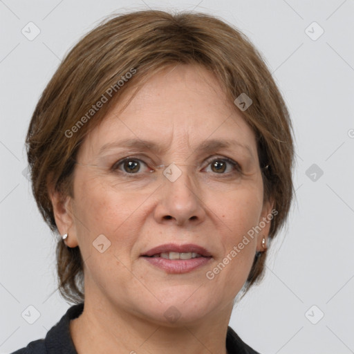 Joyful white adult female with medium  brown hair and grey eyes