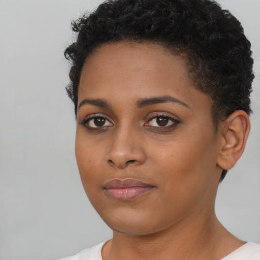 Neutral black young-adult female with short  brown hair and brown eyes