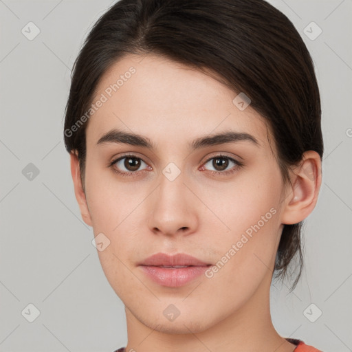 Neutral white young-adult female with short  brown hair and brown eyes