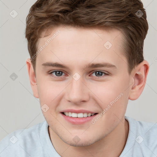 Joyful white child male with short  brown hair and brown eyes