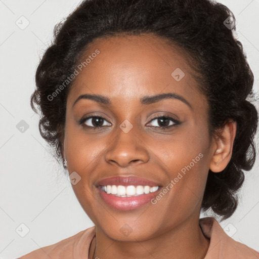 Joyful black young-adult female with long  brown hair and brown eyes