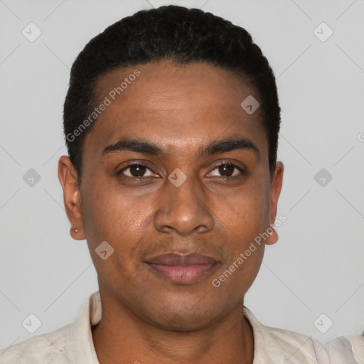 Joyful black young-adult male with short  black hair and brown eyes