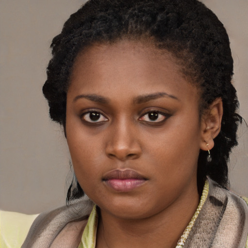 Neutral black young-adult female with short  black hair and brown eyes