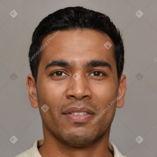 Joyful latino young-adult male with short  black hair and brown eyes