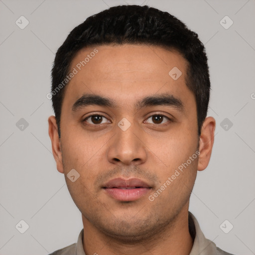 Neutral latino young-adult male with short  black hair and brown eyes