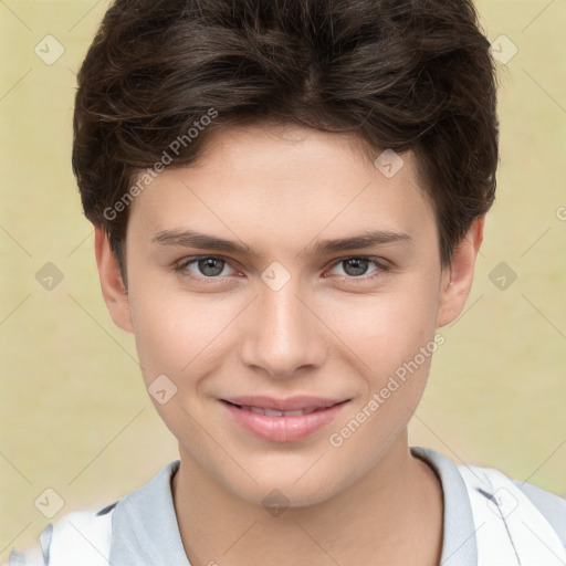 Joyful white child female with short  brown hair and brown eyes