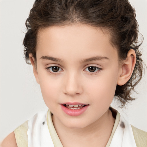 Joyful white child female with medium  brown hair and brown eyes