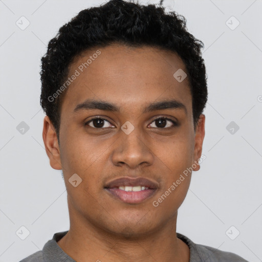 Joyful black young-adult male with short  brown hair and brown eyes