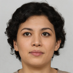 Neutral asian young-adult female with medium  brown hair and brown eyes