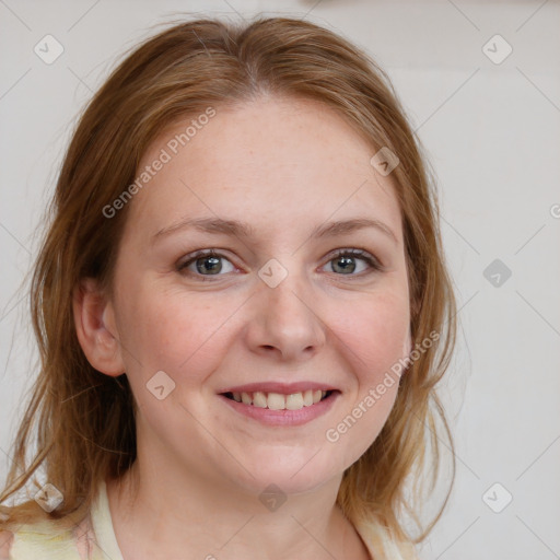 Joyful white young-adult female with medium  brown hair and blue eyes