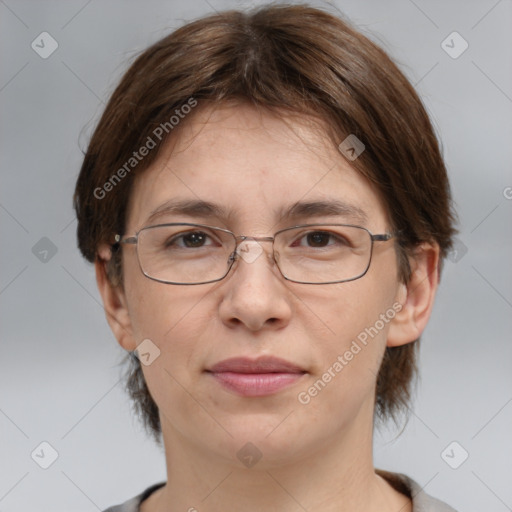 Joyful white adult female with medium  brown hair and grey eyes