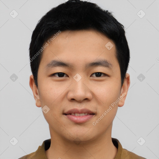 Joyful asian young-adult male with short  black hair and brown eyes