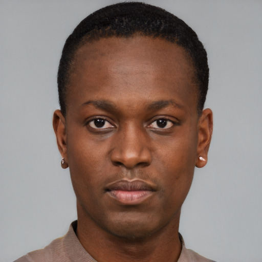Neutral black young-adult male with short  brown hair and brown eyes