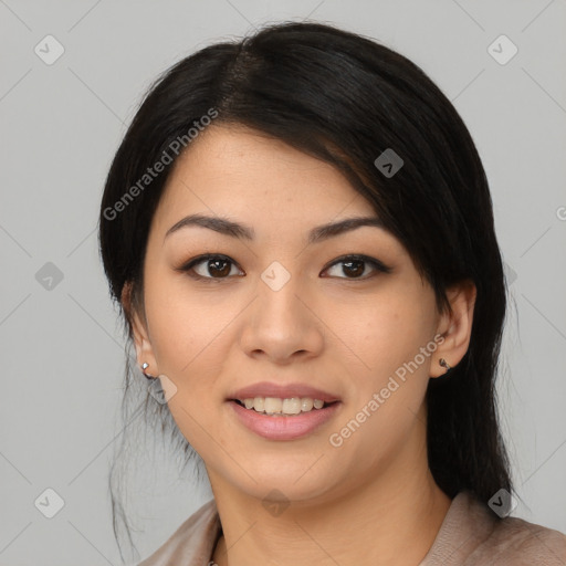 Joyful asian young-adult female with medium  black hair and brown eyes