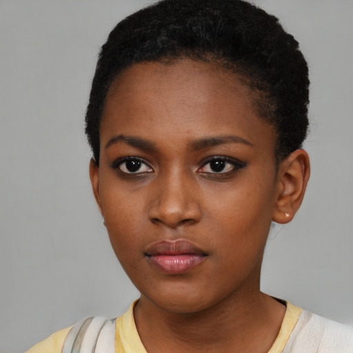 Neutral black young-adult female with short  brown hair and brown eyes