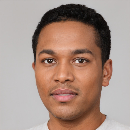 Neutral black young-adult male with short  black hair and brown eyes