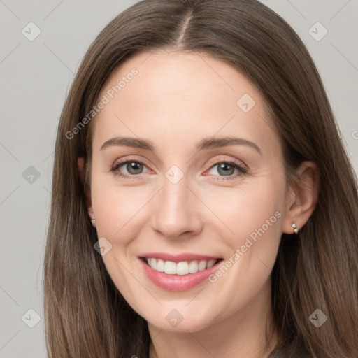 Joyful white young-adult female with long  brown hair and grey eyes